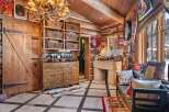 Step into rustic elegance with this stunning log cabin interior.