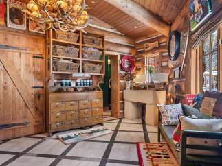 Step into rustic elegance with this stunning log cabin interior.
