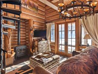 Step into rustic elegance with this stunning log cabin retreat.