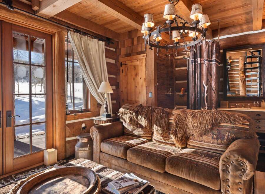 Step into rustic luxury with this stunning log cabin interior.