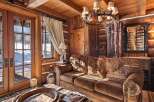 Step into rustic luxury with this stunning log cabin interior.