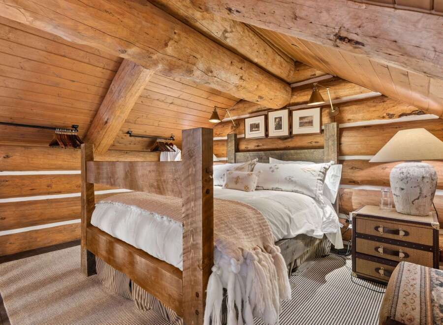 Step into rustic elegance with this stunning bedroom.