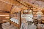 Step into rustic elegance with this stunning bedroom.