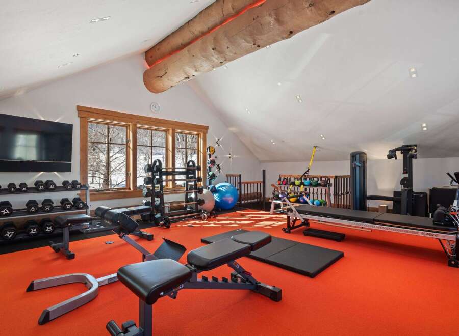 Step into a state-of-the-art home gym, designed for the ultimate fitness experience.