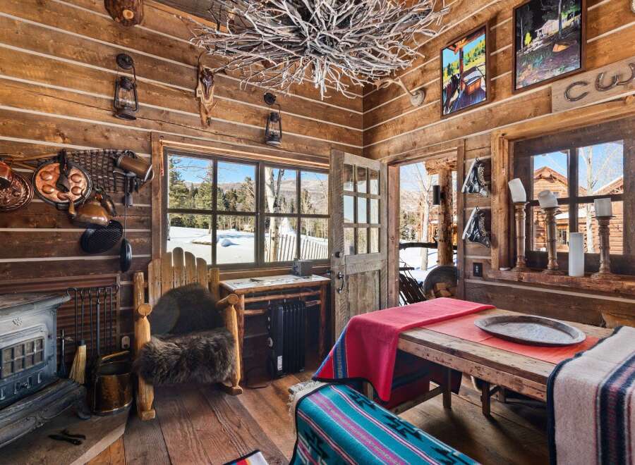 Step into rustic charm with this cozy cabin retreat.