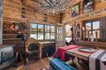 Step into rustic charm with this cozy cabin retreat.