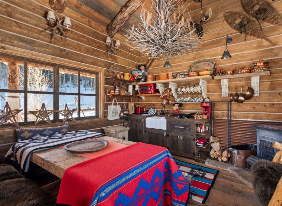 Step into rustic charm with this cozy cabin retreat.