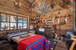 Step into rustic charm with this cozy cabin retreat.