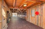 This stunning equestrian property boasts a beautifully designed stable, perfect for horse enthusiasts.