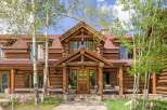 This stunning log cabin home offers a perfect blend of rustic charm and modern luxury.