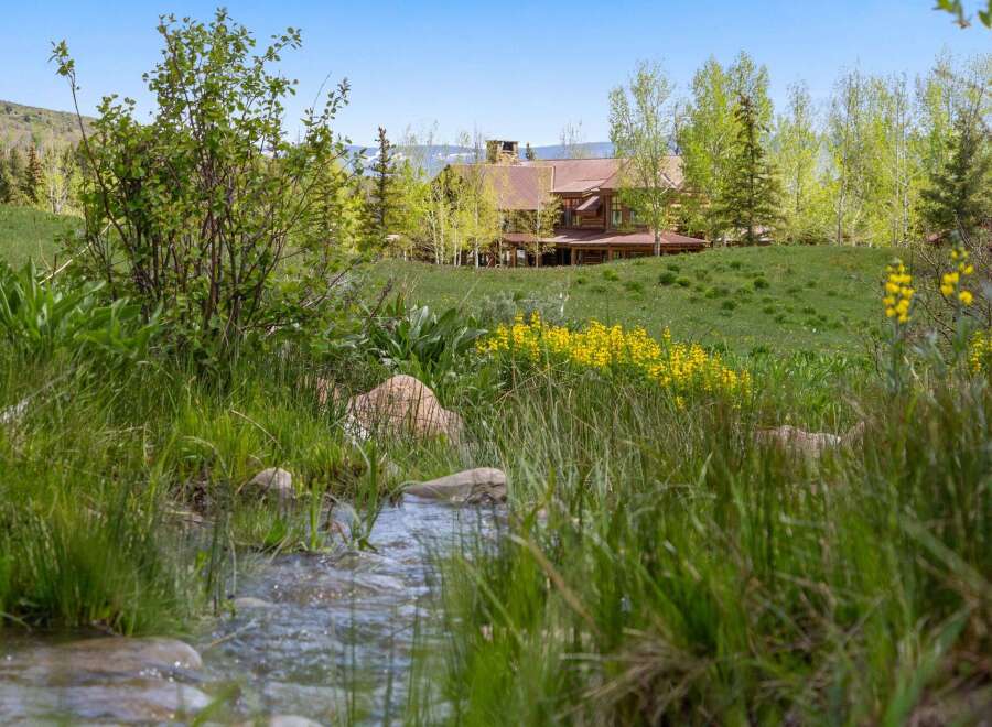 Nestled in a serene natural setting, this stunning property offers a perfect blend of luxury and tranquility.