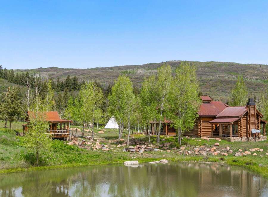 Escape to your own private oasis with this stunning log cabin retreat.