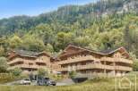 Discover the epitome of alpine living in this stunning property, featuring exquisite wooden architecture and breathtaking mountain views.