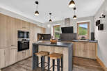 This stunning kitchen boasts modern design with a touch of rustic charm.