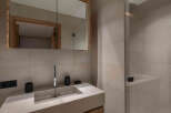Step into modern luxury with this stunning bathroom design.