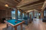 Experience luxury living in this stunning chalet, boasting breathtaking mountain views.