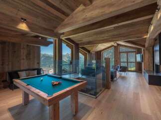 Experience luxury living in this stunning chalet, boasting breathtaking mountain views.