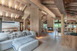 Experience the epitome of rustic luxury in this stunning property, featuring exposed wooden beams and paneling that exude warmth and character.