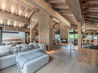 Experience the epitome of rustic luxury in this stunning property, featuring exposed wooden beams and paneling that exude warmth and character.