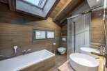 This stunning bathroom features a modern design with a luxurious feel.