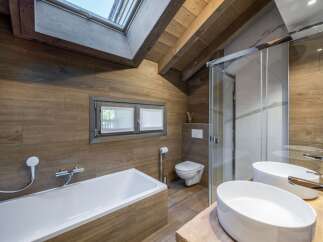 This stunning bathroom features a modern design with a luxurious feel.