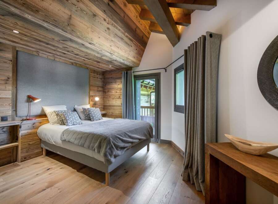 Experience rustic elegance in this stunning bedroom.