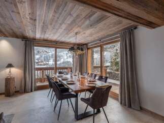 Experience luxury living in this stunning property, featuring a beautifully designed dining room.