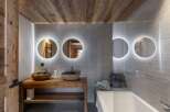 Experience rustic elegance in this stunning bathroom.
