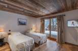 Experience the epitome of alpine luxury in this stunning bedroom.