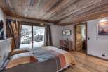 Experience the ultimate in alpine luxury with this stunning bedroom.