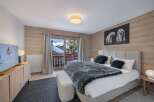 Experience luxury and comfort in this stunning bedroom.