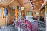 Step into a cozy cabin retreat with this charming interior.