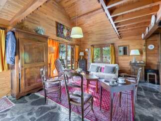 Step into a cozy cabin retreat with this charming interior.
