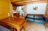 Discover the charm of this cozy property, featuring a rustic wooden interior and a welcoming atmosphere.