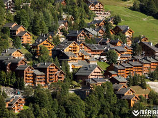 Discover the charm of mountain living in this stunning chalet village.