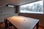 Experience the tranquility of this stunning property with a breathtaking view of a snow-covered landscape.