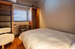 Discover the epitome of comfort and style in this beautifully designed bedroom.