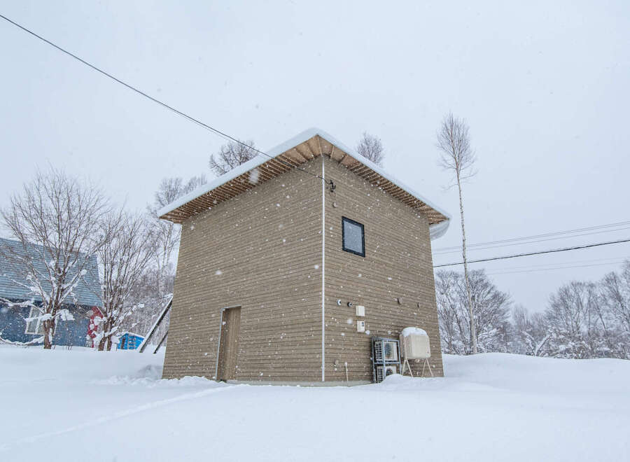 This charming property offers a unique blend of modern design and natural surroundings.