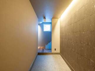 Step into a world of modern elegance with this stunning hallway design.
