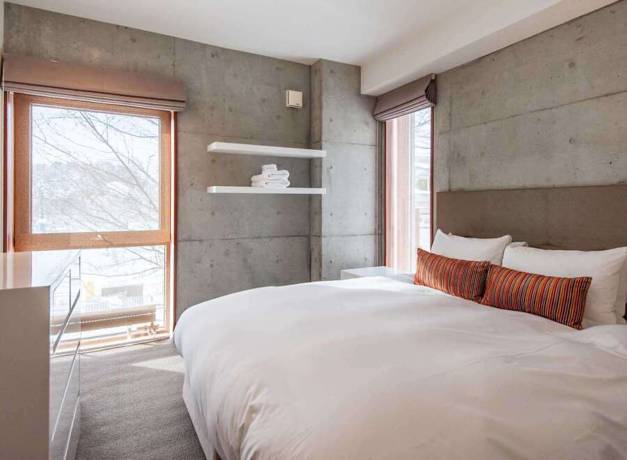 Experience modern luxury in this stunning bedroom.