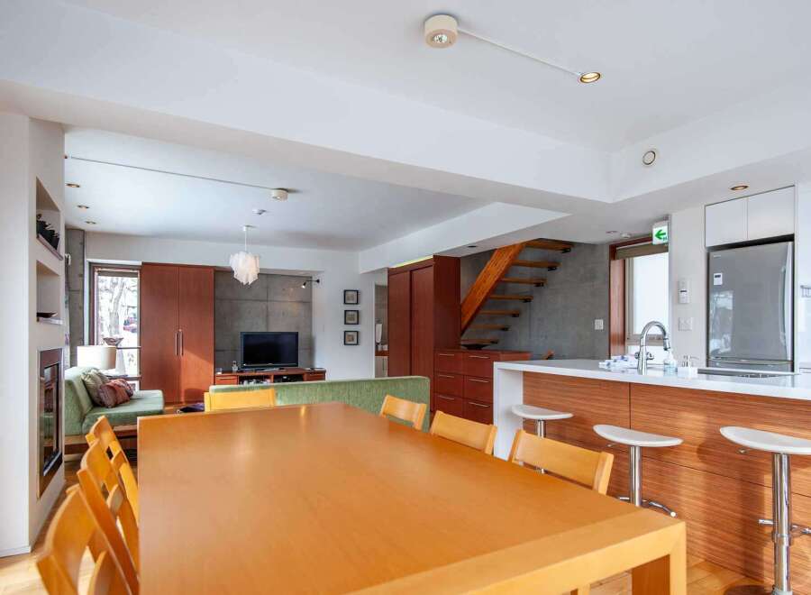This modern home boasts a spacious open-plan living area, perfect for entertaining.