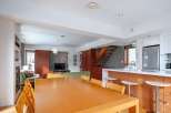 This modern home boasts a spacious open-plan living area, perfect for entertaining.