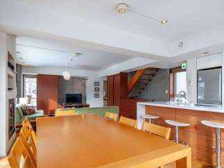 This modern home boasts a spacious open-plan living area, perfect for entertaining.