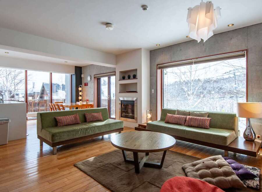 Experience luxury living in this stunning property! This home features a spacious living area with a cozy fireplace, perfect for relaxing evenings.