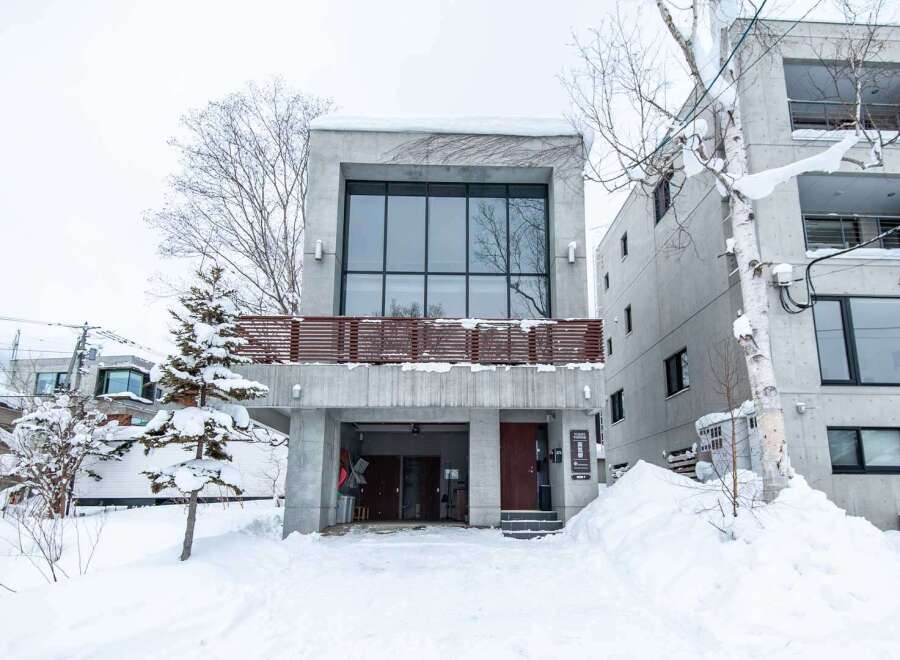 This modern property boasts a sleek, contemporary design with a striking facade.