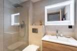 Step into modern luxury with this stunning bathroom.