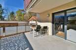 Enjoy breathtaking views from this stunning balcony! This property features a modern outdoor dining set, perfect for entertaining or relaxing.