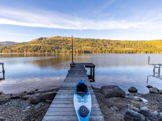 Enjoy serene lakefront living with this stunning property.