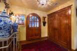 Step into luxury with this stunning entryway, showcasing exquisite craftsmanship and timeless elegance.