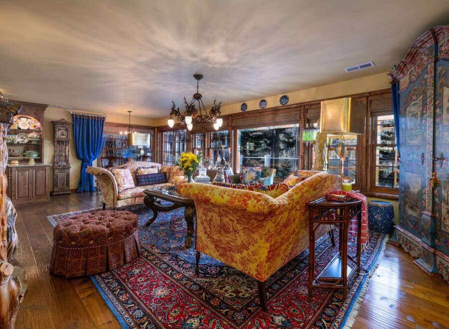 Step into luxury with this stunning living room, showcasing exquisite design and attention to detail.
